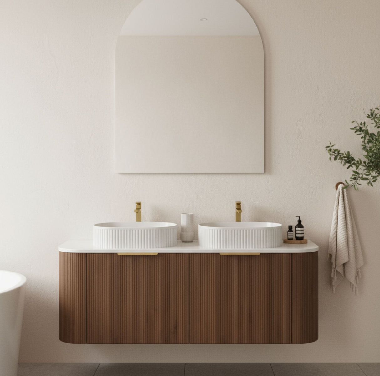 Bathroom with wooden vanity, white sinks, and a large mirror.
