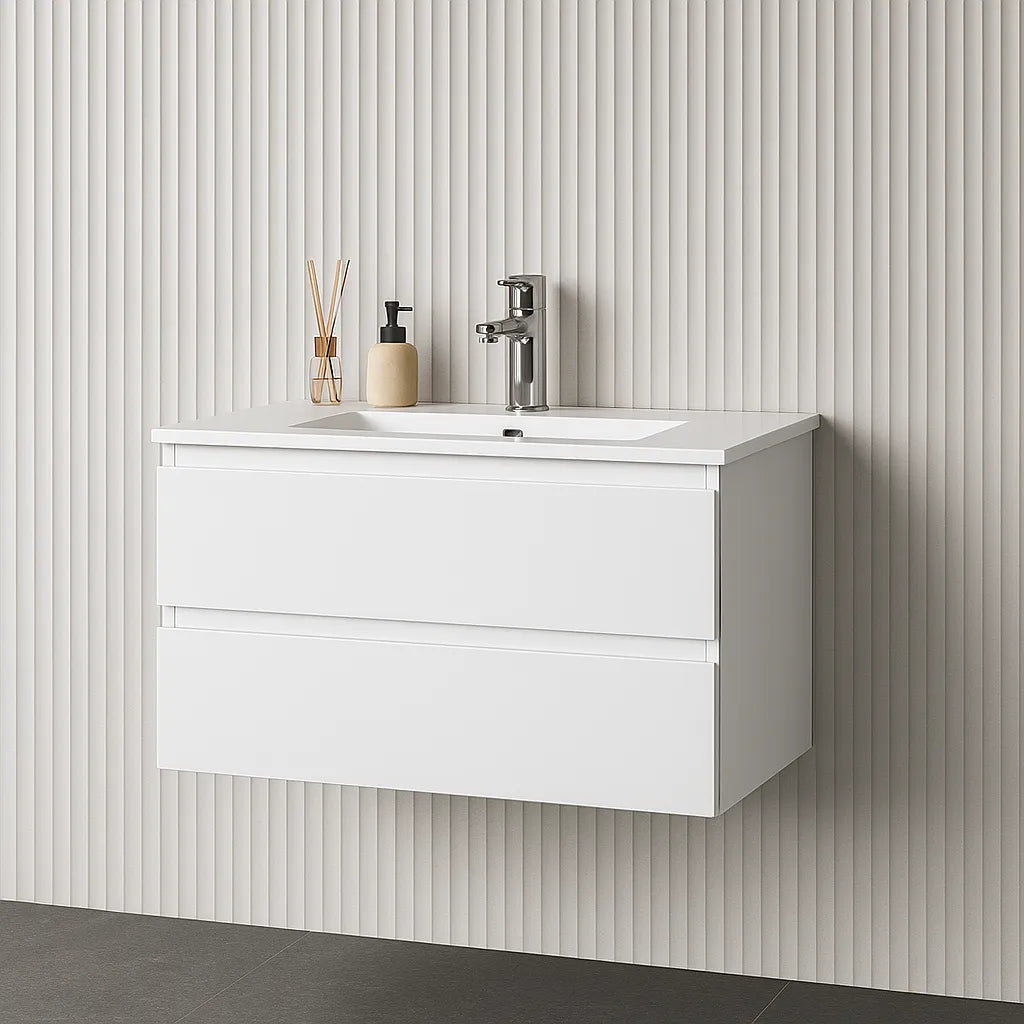 White wall-mounted vanity with sink and faucet against a striped wall.