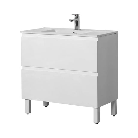 White bathroom vanity with sink and faucet on a white background