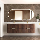 Bathroom vanity with wooden finish, oval mirror, and decorative elements.