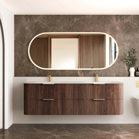 Bathroom vanity with wooden finish, oval mirror, and decorative elements.