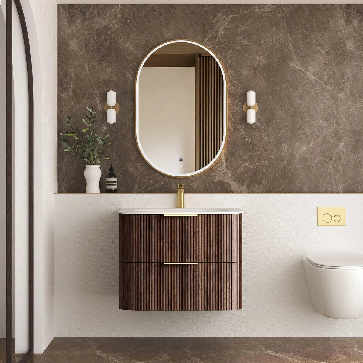 Modern bathroom with wooden vanity, round mirror, and decorative elements.