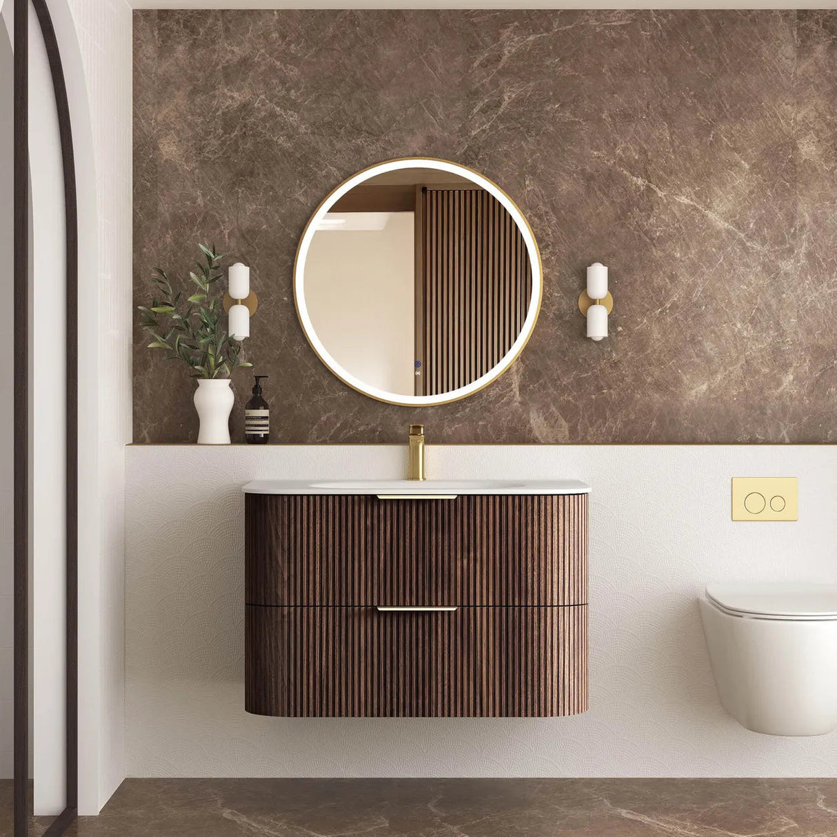 Bathroom with wooden vanity, round mirror, and decorative elements.