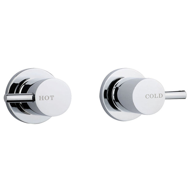 Chrome hot and cold water control valve on a white background