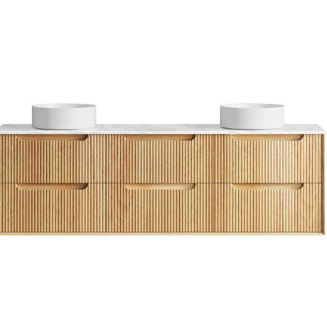 Bathroom vanity with wooden finish and white countertop