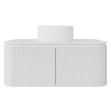 White cylindrical object with ribbed texture on a white background