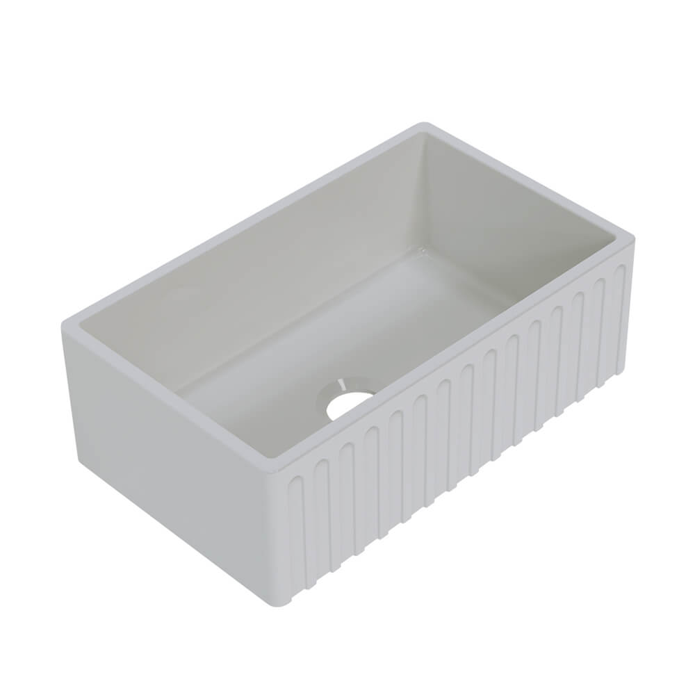 White rectangular sink with ribbed design on a white background
