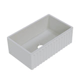 White rectangular sink with ribbed design on a white background