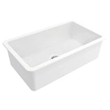 A white rectangular apron-front sink with a rounded rim and a visible drain, shown on a plain white background.