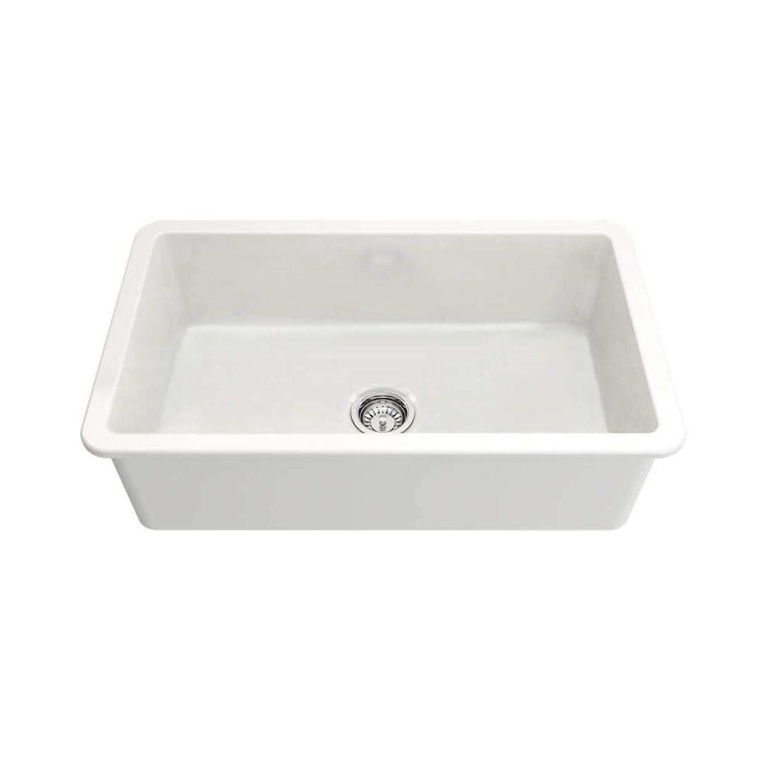 A white rectangular farmhouse-style kitchen sink with a single basin and a central drain, shown on a plain white background.