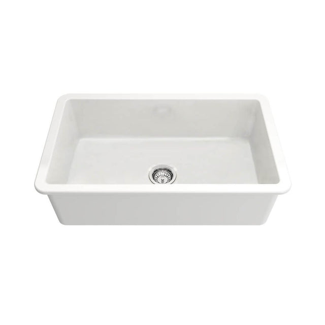 A white rectangular farmhouse-style kitchen sink with a single basin and a central drain, shown on a plain white background.
