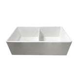 A white ceramic double-bowl farmhouse sink with a rectangular shape and a central divider, shown against a plain white background.