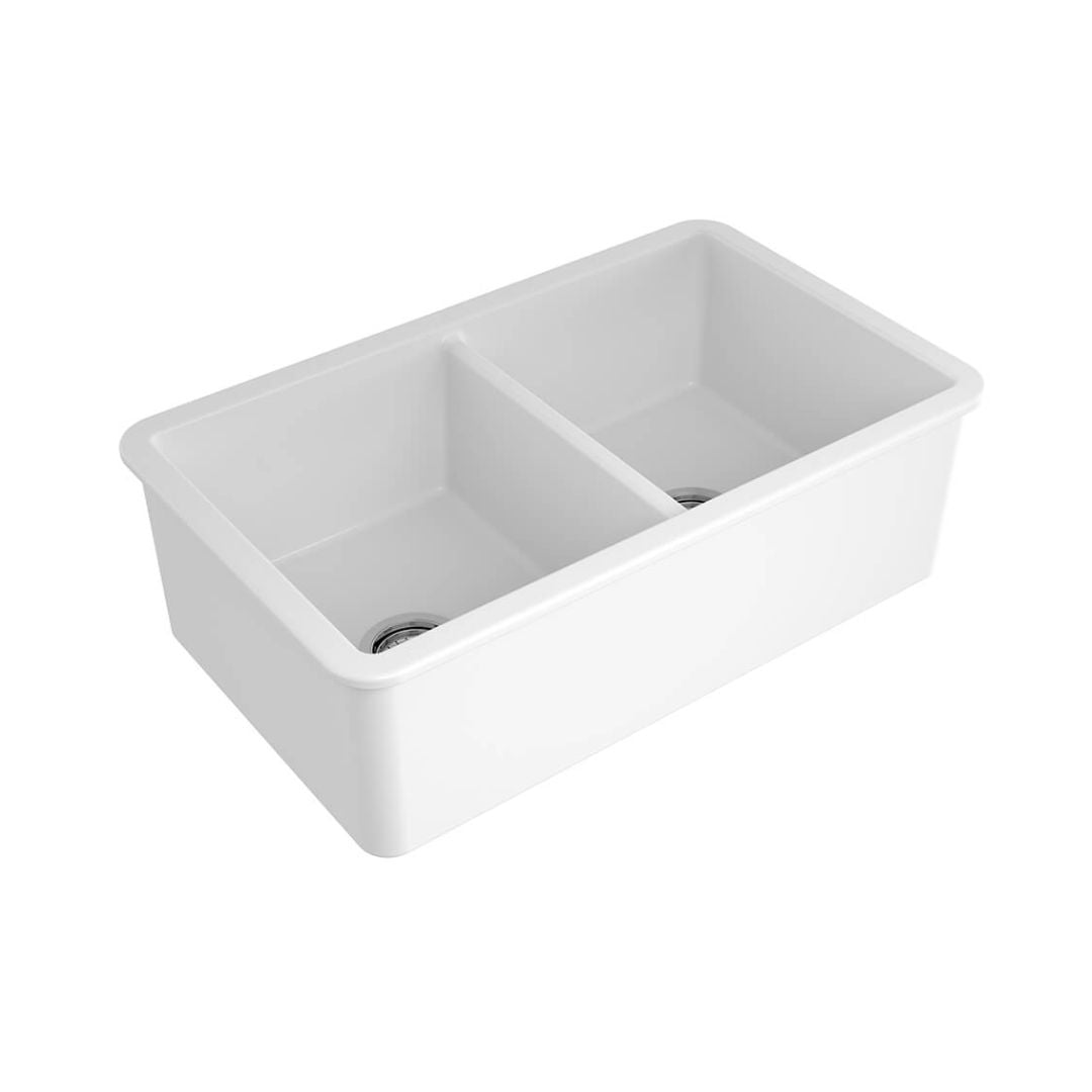 A white double-bowl farmhouse kitchen sink with a deep rectangular basin and a central divider, shown on a plain white background.