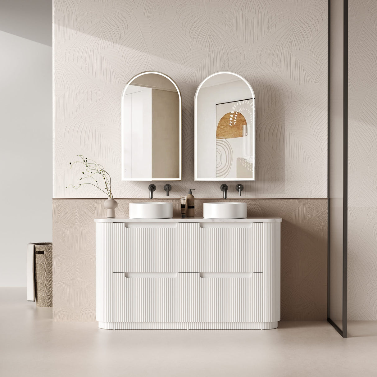 Bathroom vanity with two sinks and mirrors in a modern setting