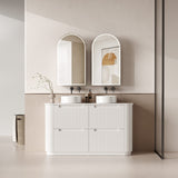 Bathroom vanity with two sinks and mirrors in a modern setting