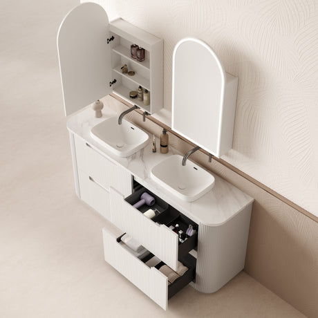 Bathroom vanity with open cabinet and mirror in a neutral setting