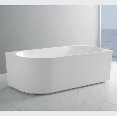 White freestanding bathtub in a modern bathroom setting