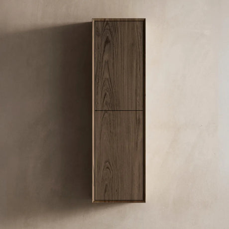 Wooden cabinet with a dark finish on a beige wall