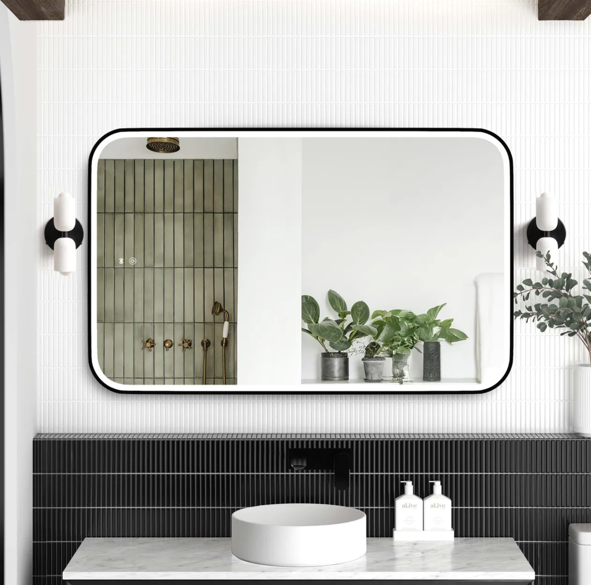Bathroom with a large mirror, sink, and decorative elements.