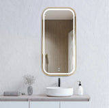 Bathroom vanity with a rectangular mirror, sink, and decorative items on a light gray wall.