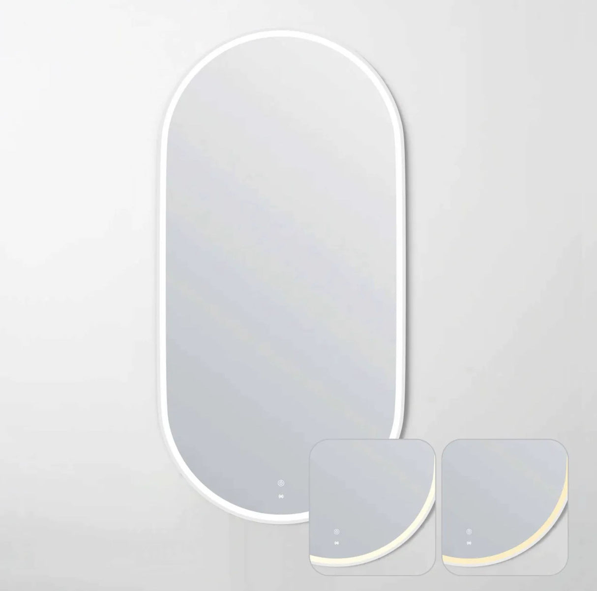Modern wall mirror with two decorative plates on a light gray background