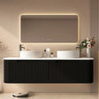 Modern bathroom vanity with illuminated mirror and decorative elements.