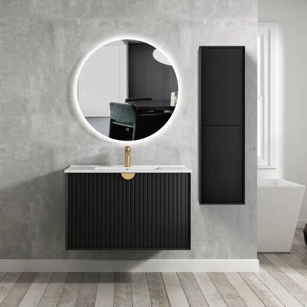 Bathroom with black vanity unit, round mirror, and tall black cabinet.