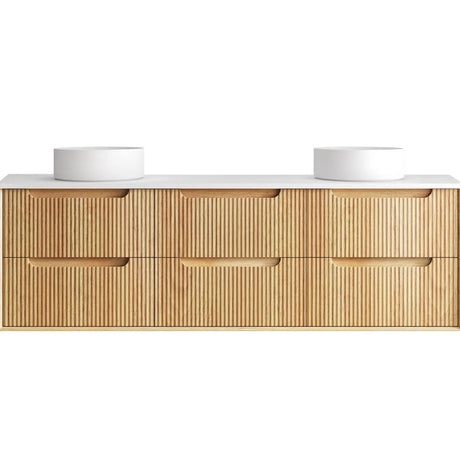 Bathroom vanity with wooden finish and white countertop