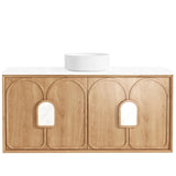 Wooden bathroom vanity with white countertop and round sink on a white background