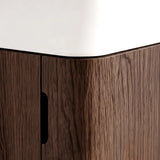 Close-up of a modern cabinet corner with dark brown wood grain doors and a white curved top surface.