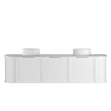 White countertop with two white cylindrical objects on a white background
