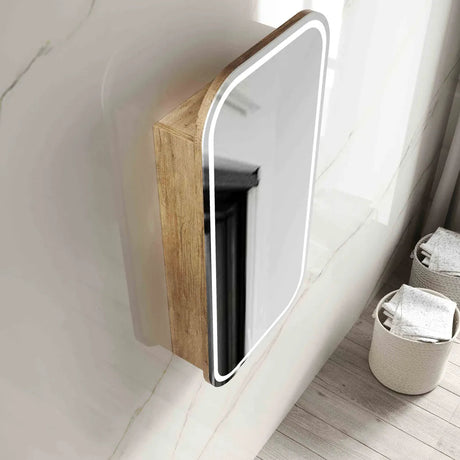 Bathroom corner with a mirror and laundry baskets.