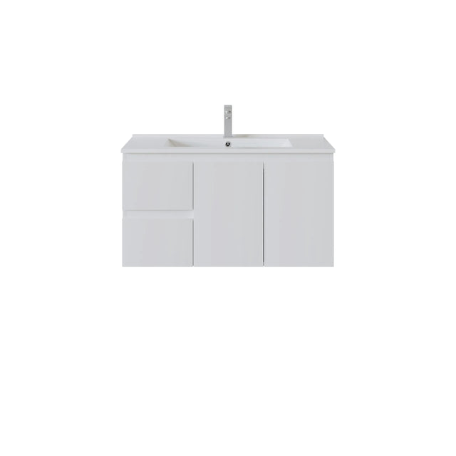 A modern left hand white bathroom vanity cabinet with an integrated sink and a tall, slim chrome faucet, shown against a plain white background