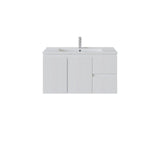 A modern right hand white bathroom vanity cabinet with a matching white integrated sink and a tall chrome faucet, shown against a plain white background.