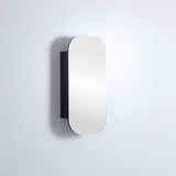 Rectangular mirror with black frame on a light gray background