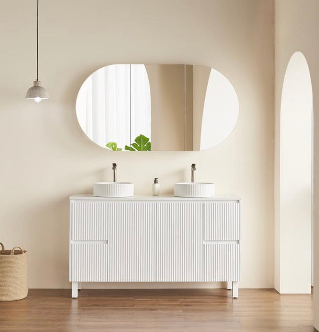room with white 1500mm shaving cabinet and free standing white vanity