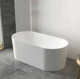 White freestanding bathtub in a modern bathroom setting