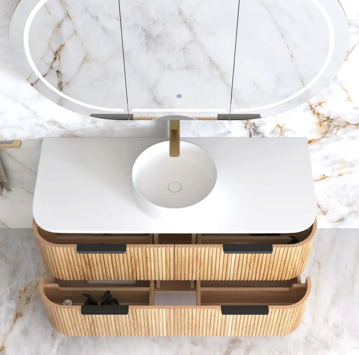 Bathroom vanity with rattan design and round mirror on marble countertop