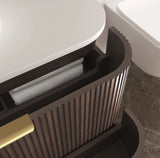 Bathroom vanity with storage compartment and towel on a tiled floor