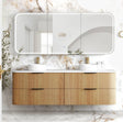 Bathroom vanity with wooden cabinet, double sink, and large mirror on a marble wall.