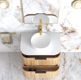 Bathroom vanity with white sink and wooden storage drawers on a marble countertop.