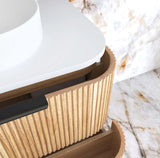 Bathroom vanity with wooden finish and white countertop on a marble floor