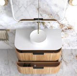 Bathroom vanity with rattan drawers and white countertop on a marble wall background
