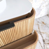 Wooden storage basket with a white lid on a marble surface