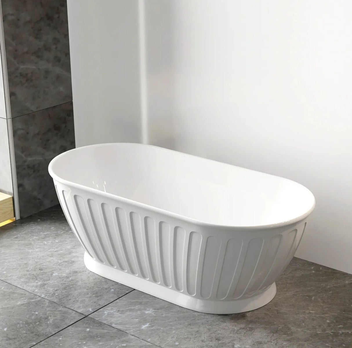 White freestanding bathtub in a bathroom setting with tiled floor and wall.