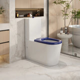 Modern bathroom with a white toilet and blue seat cover.