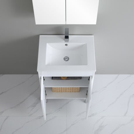 White bathroom vanity with sink against a gray wall