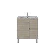 A modern bathroom vanity cabinet with a light oak wood grain finish, a white integrated sink, and a tall chrome faucet, shown against a plain white background.