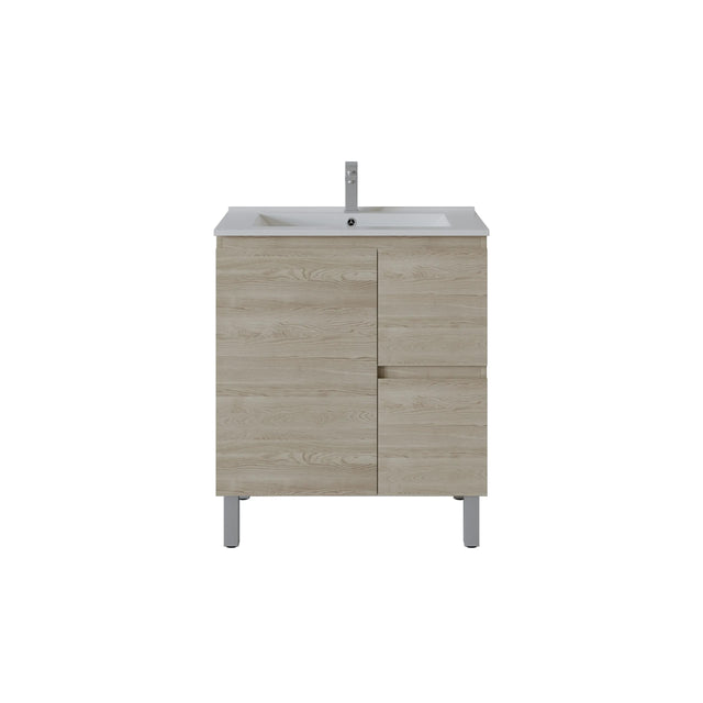 A modern bathroom vanity cabinet with a light oak wood grain finish, a white integrated sink, and a tall chrome faucet, shown against a plain white background.