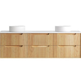 Bathroom vanity with wooden finish and white countertop